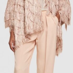 Giorgio Armani rose gold fringe jersey Poncho $2,595. Metallic fringe cape.